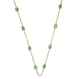Emerald station necklace in 14k yellow gold