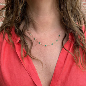 Emerald station necklace in 14k yellow gold