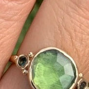 14k Green tourmaline (2.8cts) with Parti Sapphires ring