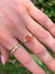 Fire Opal Ring with diamond clusters in 14k gold