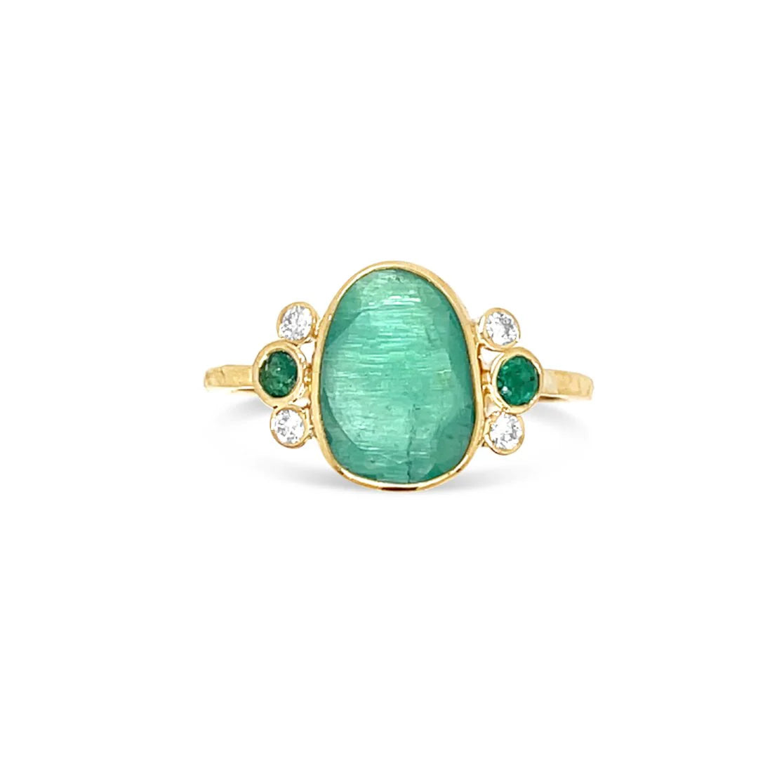 Zambian Emerald Ring with emeralds and diamonds accents.  Presented in  14k yellow gold