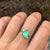 Zambian Emerald Ring with emeralds and diamonds accents.  Presented in  14k yellow gold