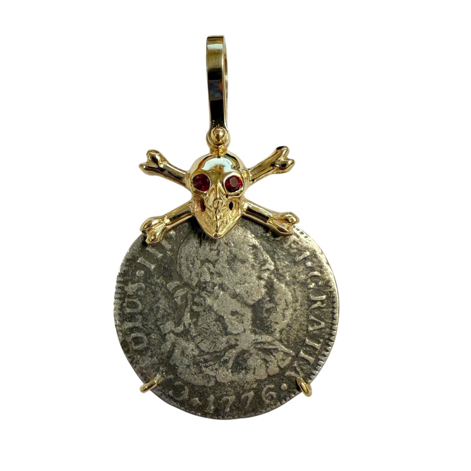 El Cazador Shipwreck - 2 Reales - Dated 1776 - Presented in a 14K gold skull and cross bones