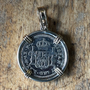 El Cazador Shipwreck - 1 Reales - Mint Plus  - Dated 1783 - Mounted in sterling silver with 14K prongs and bale