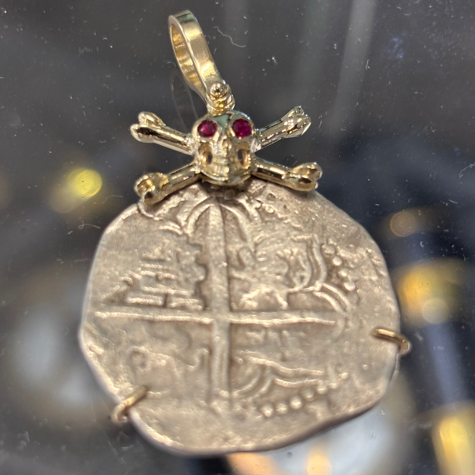 Authentic Spanish Cob - 4 Reales - Assayer "Q"  (1612-1616) - Presented in 14K skull and crossbones with Ruby accented  eyes