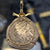 Authentic Spanish Cob - 4 Reales - Assayer "Q"  (1612-1616) - Presented in 14K skull and crossbones with Ruby accented  eyes
