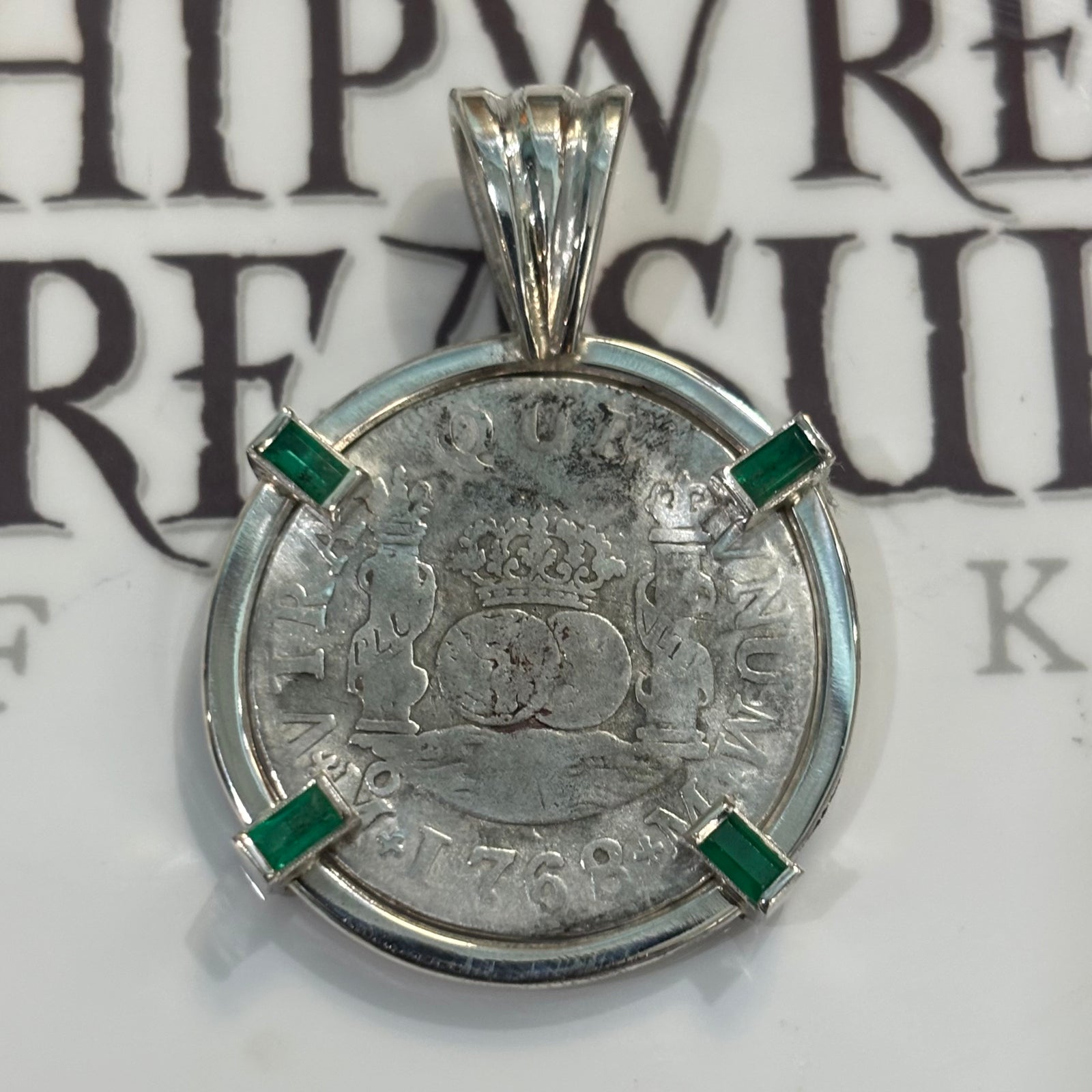 El Cazador Shipwreck - 1/2 Reales  - Dated 1768 - Mounted in Sterling Silver with Emerald accents