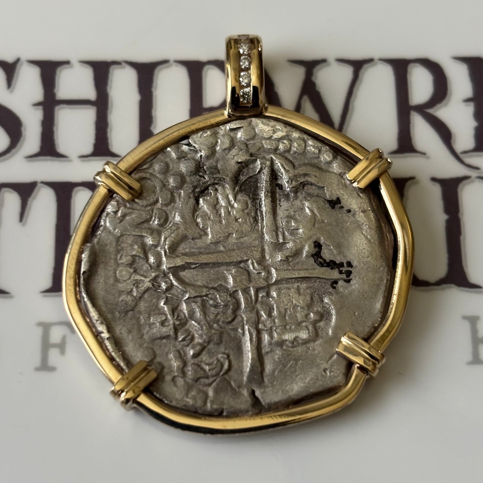 San Jose Shipwreck 1631 - 4 Reale - Grade 2 - Assayer "P" - Mounted in 14K gold with diamond accents on the bale.