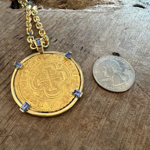 Authentic Spanish Gold Escudos - Dated: 1714 - Minted in Seville, Spain.  Mounted in 18K gold with 1.30 CTW of Sapphires