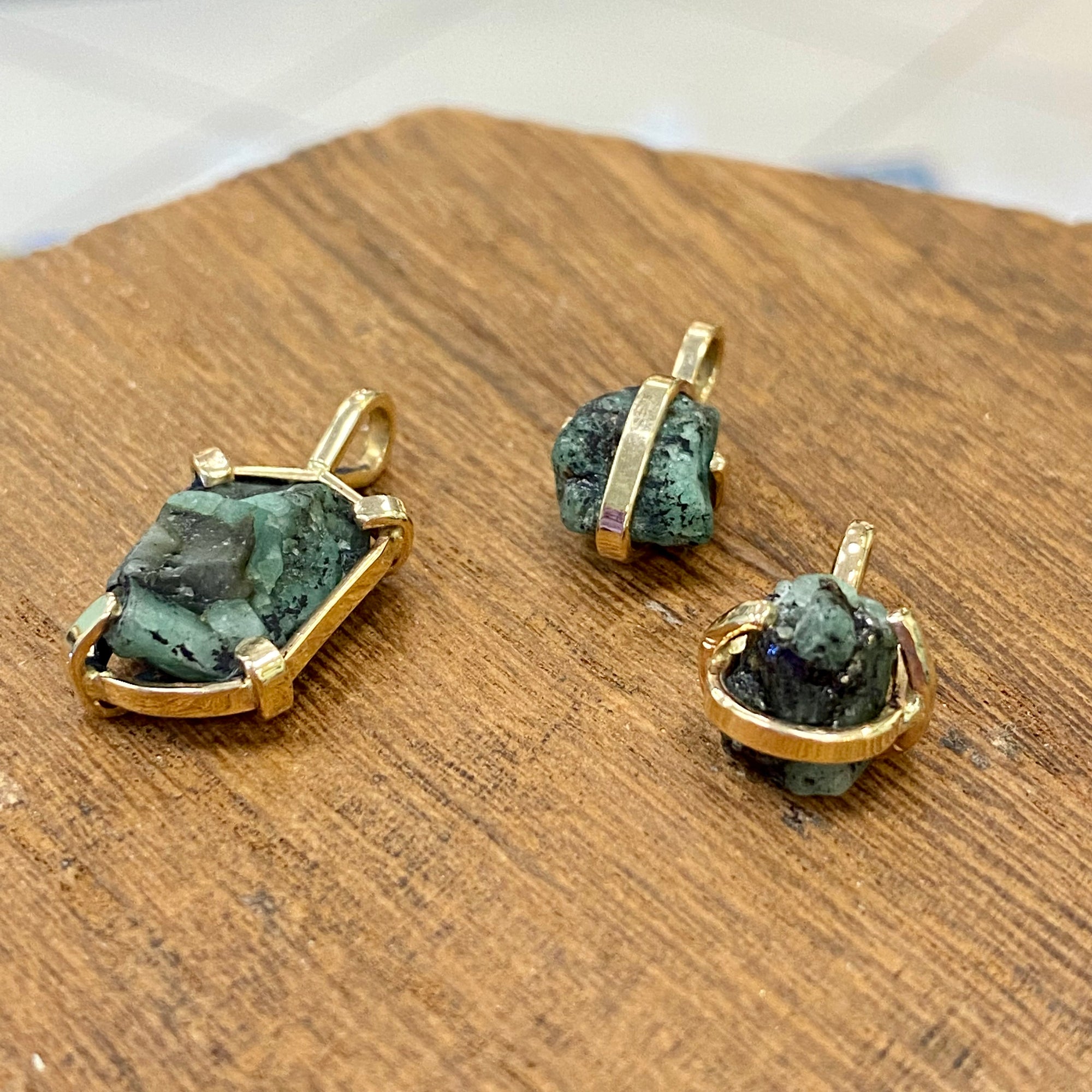 Raw Emerald mounted in 14k Gold (Gold filled chain included)