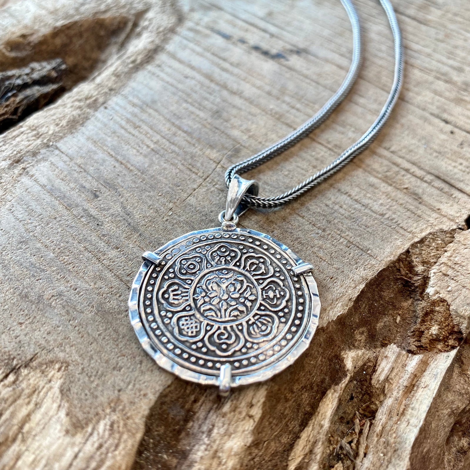 Tibetan Tangka Coin -  Lotus Flower + Buddhist Lucky Symbols - Mounted Sterling Silver - (Includes sterling chain)