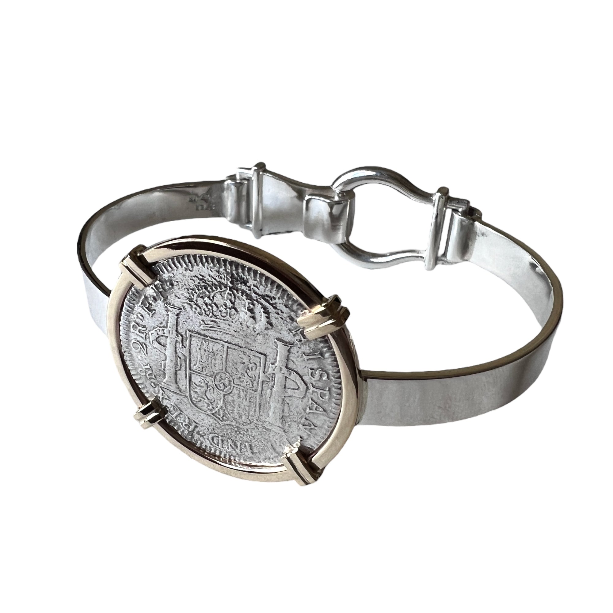 El Cazador Shipwreck - 2 Reales  - Carlos III - Dated 1781 - Grade Fine plus - Presented in a Sterling Silver Bracelet with 14K frame around coin.